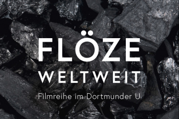 Ausstellungsplakat mit Aufschrift Flöze Weltweit und Kohlebrocken